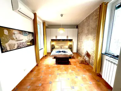 Letto o letti in una camera di Casa Madre
