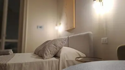 Letto o letti in una camera di Ta-49 bed e breakfast