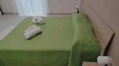 Letto o letti in una camera di Pupetta s' House