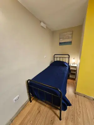 Letto o letti in una camera di La casa di Anna