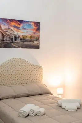 Letto o letti in una camera di Napoli centro DM apartment