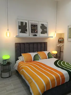 Letto o letti in una camera di Emma house Napoli centro storico