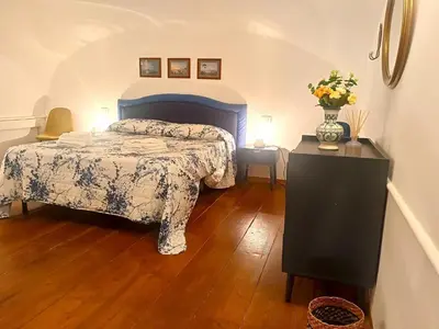 Letto o letti in una camera di Piazzetta 4 - Casa Vacanze