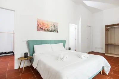 Letto o letti in una camera di Giglio Borbonico By Dimorra