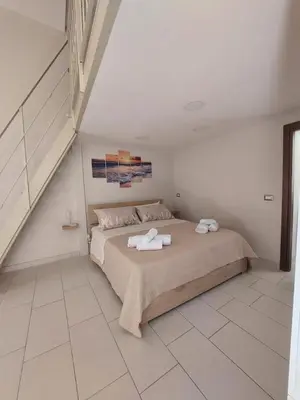 Letto o letti in una camera di Tarantè Apartment