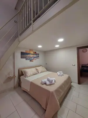 Letto o letti in una camera di Tarantè Apartment