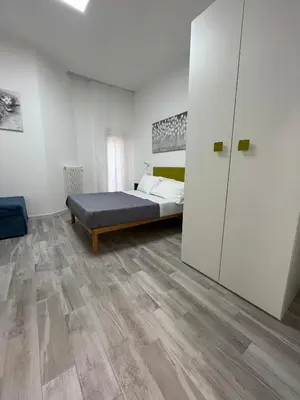 Letto o letti in una camera di Prospettiva Medina