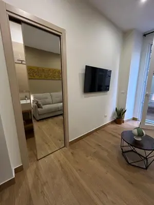 TV o dispositivi per l'intrattenimento presso Somnia Luxury Rooms