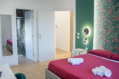 Letto o letti in una camera di WANDERLUST SPACCANAPOLI Points Of View