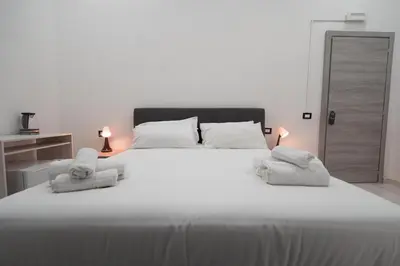 Letto o letti in una camera di La corte dei decumani