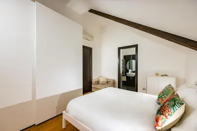 Letto o letti in una camera di Un Terrazzo Panoramico su Napoli by Wonderful Italy