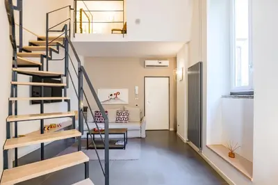 Area soggiorno di DUOMO TERRACE - Luxury Apartment with Private Parking in Naples Historic Center