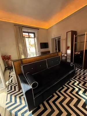 TV o dispositivi per l'intrattenimento presso Unicum Suite Grande Archivio Napoli Centro Storico