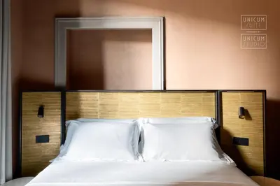 Letto o letti in una camera di Unicum Suite Grande Archivio Napoli Centro Storico
