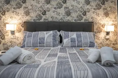 Letto o letti in una camera di B&B Murolo's Home