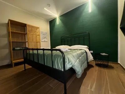 Letto o letti in una camera di Yaya Home