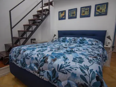 Letto o letti in una camera di Duomo Porto University Suite