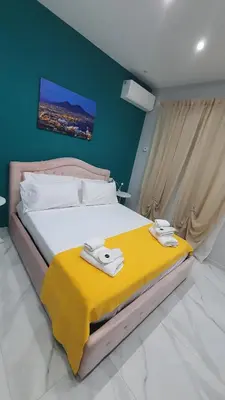 Letto o letti in una camera di Ilary's House Pulcinella - Centro Storico Spaccanapoli