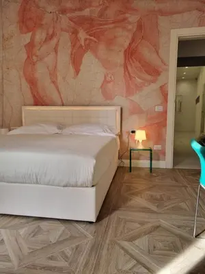 Letto o letti in una camera di Relais Santa Lucia sul Mare, Napoli