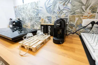 Set per la preparazione di tè e caffè presso La casa di Bianca - modern suites near Plebiscito
