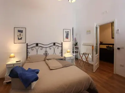 Letto o letti in una camera di Napoli Pietrasanta LT