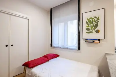 Letto o letti in una camera di Casa Metis a Mergellina