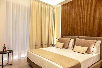 Letto o letti in una camera di Mamalu - Corso Umberto 35 - Studios and Suites