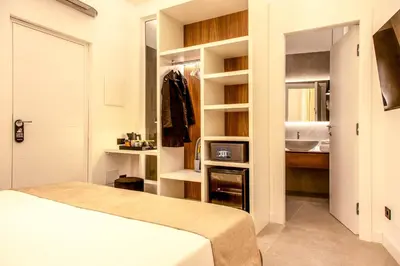 Letto o letti in una camera di Mamalu - Corso Umberto 35 - Studios and Suites