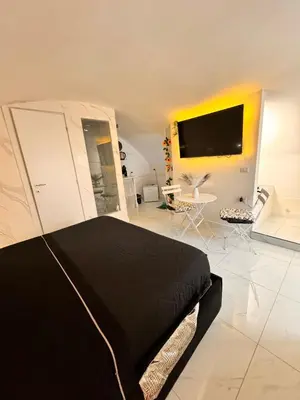 TV o dispositivi per l'intrattenimento presso House Luxury Toto