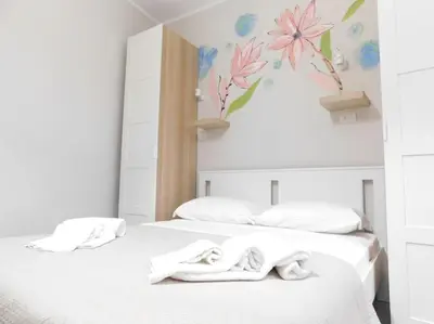 Letto o letti in una camera di Appartamento Isabel a Cavour