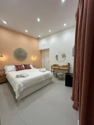 Letto o letti in una camera di B&B Core Analfabeta