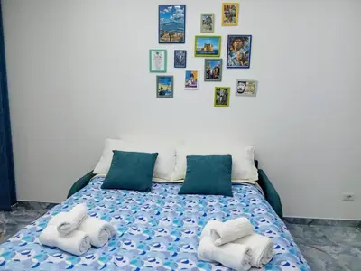 Letto o letti in una camera di La casa di Viviana Duomo centro storico di Napoli