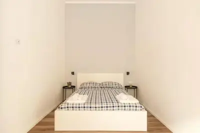 Letto o letti in una camera di Casa Nina palazzo Bonifacio