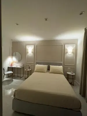 Letto o letti in una camera di Carafa Rooms