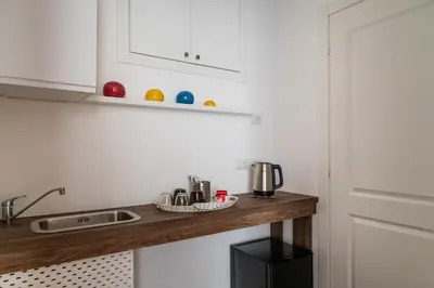 Cucina o angolo cottura di The Napolitaner - Duomo Suite