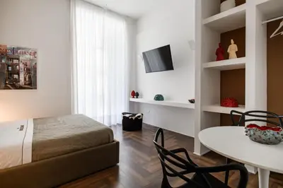 Letto o letti in una camera di The Napolitaner - Duomo Suite