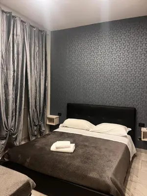 Letto o letti in una camera di International Hotels