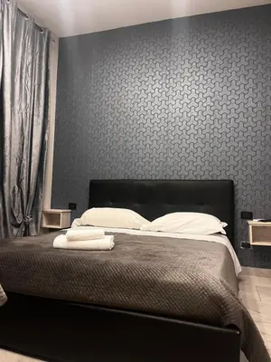 Letto o letti in una camera di International Hotels