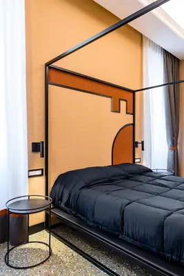 Letto o letti in una camera di Capuana15 by NapoliApartments