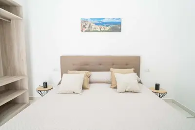 Letto o letti in una camera di Penthouse