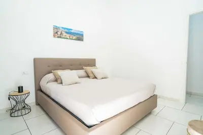 Letto o letti in una camera di Penthouse