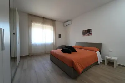 Letto o letti in una camera di Panorama Vesuvius Affittacamere Guesthouse with Lift near to Subway in Napoli Center