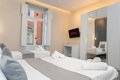 TV o dispositivi per l'intrattenimento presso Relais Mermaid Luxury Suite