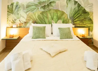Letto o letti in una camera di A casa di Leo Rooms