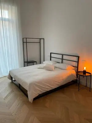 Letto o letti in una camera di Chiaia N 24