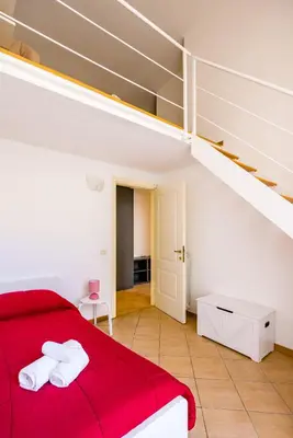 Letto o letti in una camera di Materdei Beautiful Terrace by NapoliApartments