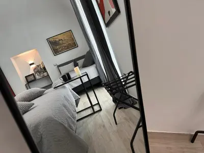 Letto o letti in una camera di NapArt Suites - My Place