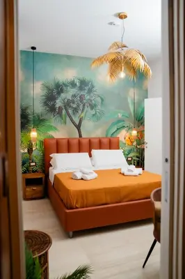 Letto o letti in una camera di Four Points Suites