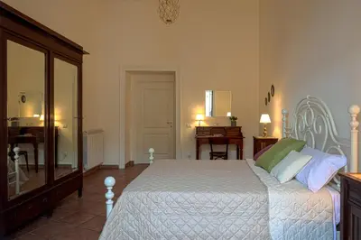 Letto o letti in una camera di Mariù's sweet home