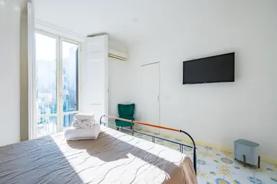 TV o dispositivi per l'intrattenimento presso Palazzo Loffredo by NapoliApartments